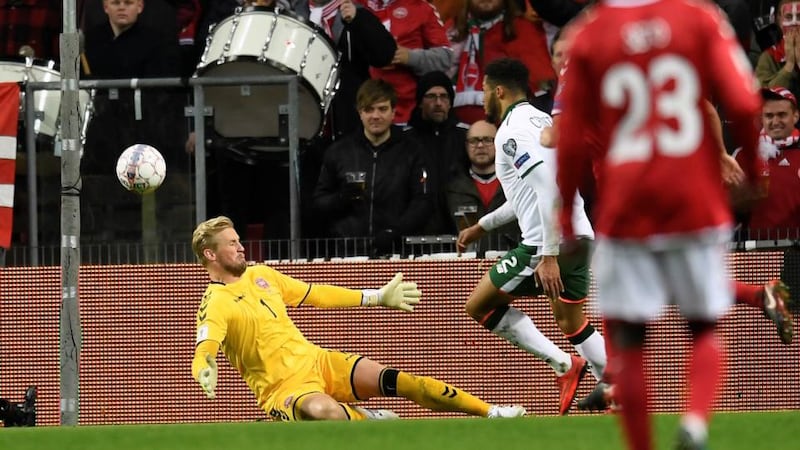 Danish goalkeeper Kasper Schmeichel stops a close-range shot from Ireland’s Cyrus Christie at Parken stadium in Copenhagen on Saturday. Photograph: Lars Moeller/Reuters