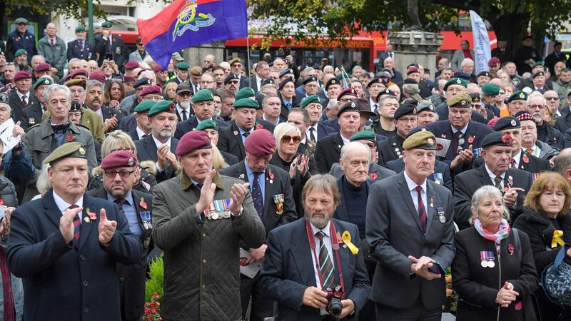 A crowd gathers outside St Andrew’s Church during a funeral service for Dennis Hutchings on Thursday in Plymouth, England. The 80-year-old British army veteran died after contracting Covid-19 while on trial for the attempted murder of John Pat Cunningham  in 1974. Photograph: Finnbarr Webster/Getty Images