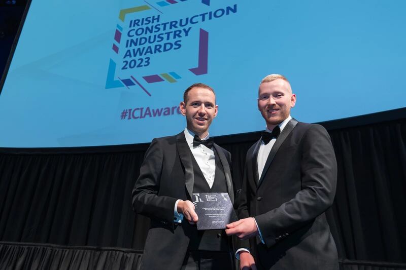 Brendan Mitchell, regional director of Meinhardt Ireland, presents the contractor residential project of the year award to Neil Wall, BusinessRiver on behalf of PJ Hegarty & Sons