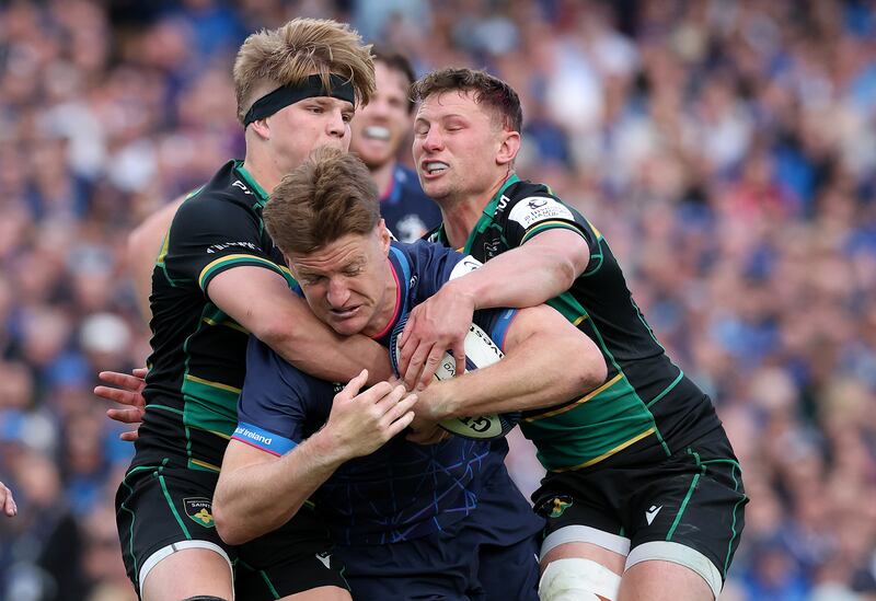 Leinster's Jordie Barrett is tackled by Northampton's Henry Pollock and Fraser Dingwall. Photograph: David Rogers/Getty Images