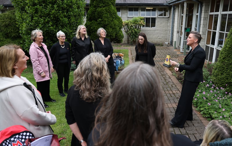 Conductor Eimear Crehan (right)  rehearses with the SUSO choir (Speak Up, Sing Out) from Kilcock ahead of competing at DCU/ All Hallows in the annual Feis Ceoil.  Photo: Bryan O’Brien / The Irish Times 
