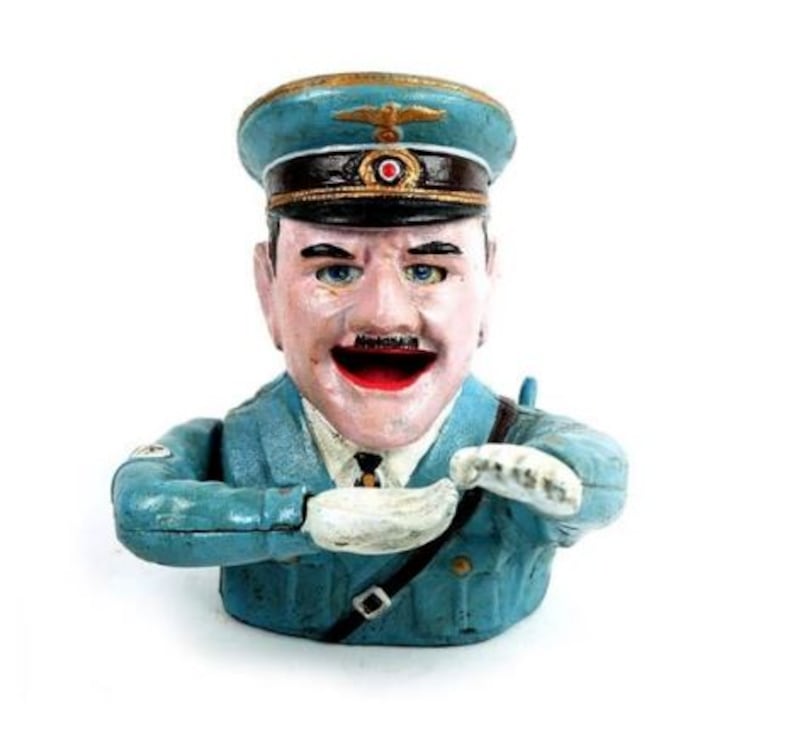  A cast iron money box in the form of a saluting Adolf Hitler scheduled for auction by Mullen’s at Laurel Park