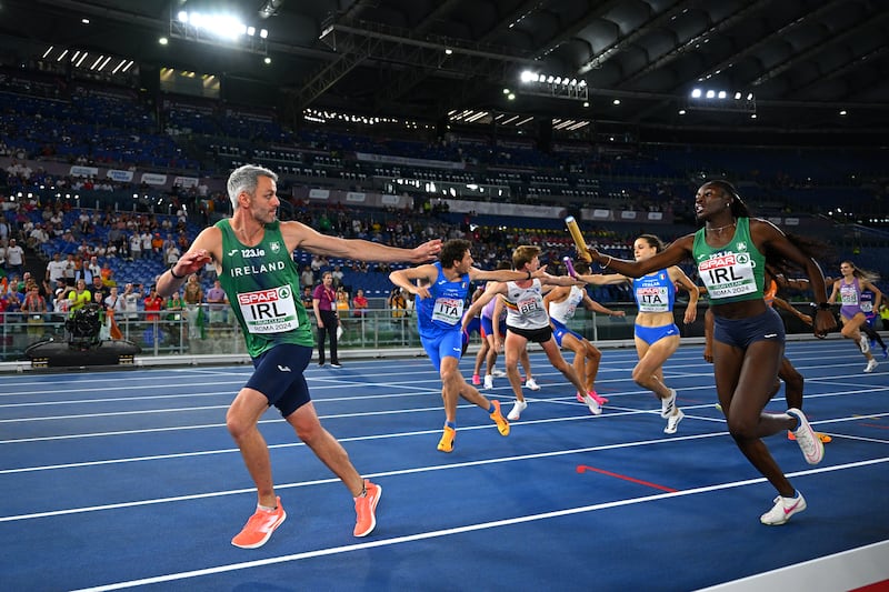 Rhasidat Adeleke passes the baton to Thomas Barr during the 4x400m mixed relay final at the 2024 European Athletics Championships in Rome. Photograph: Mattia Ozbot/Getty Images for European Athletics