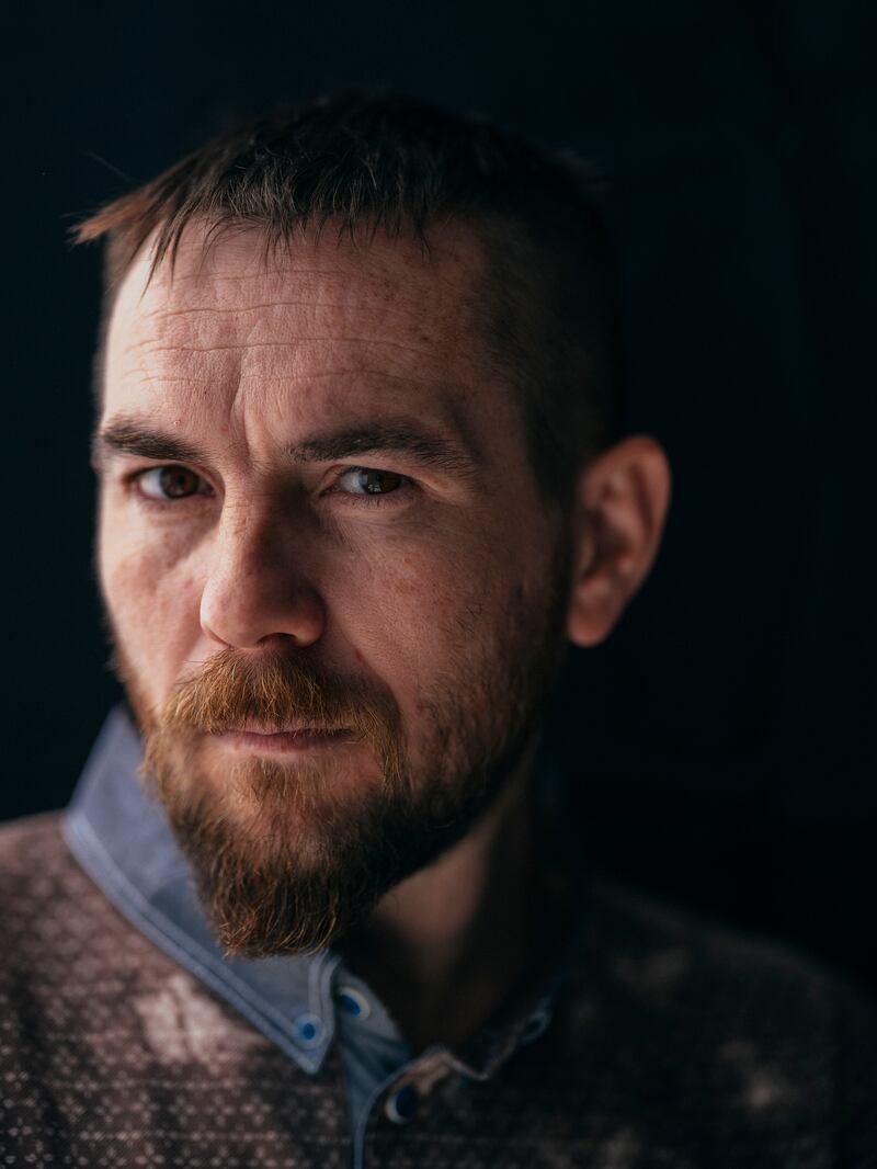 Roman Shapovalenko, a farm worker who was also an activist during the Russian occupation of Kherson and was tortured with electric shocks, photographed in Kyiv, Ukraine, May 2023. Photograph: Daniel Berehulak/The New York Times
                      