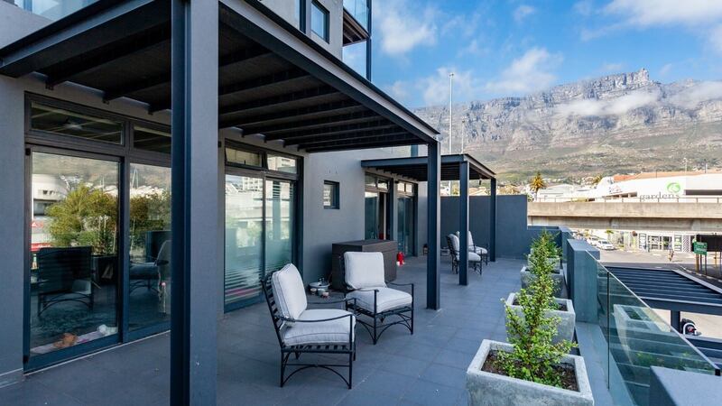 This Cape Town corner apartment  has two balconies, giving 100sq m of outdoor living space