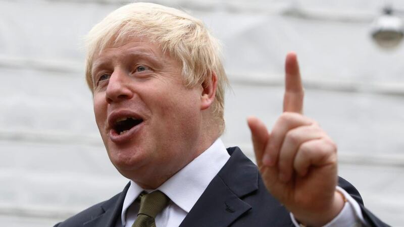 London mayor Boris Johnson speaks to members of the media in London today. Mr Johnson, widely regarded as a potential challenger to prime minister David Cameron, said he would try to run for parliament in next year’s national election. Photograph: Reuters