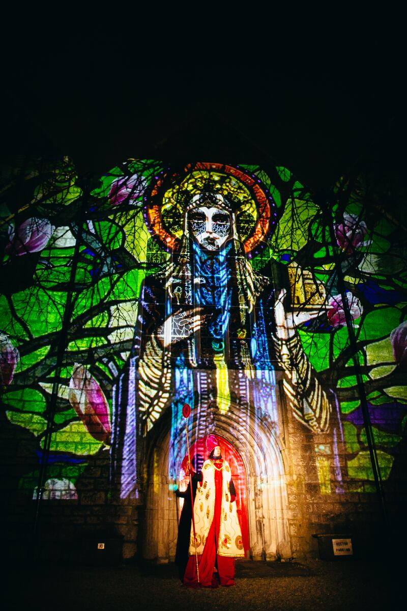 Áine Philips as Brigid and art by Jennifer Rothwell as part of Herstory Light Show in Galway on Friday. Photograph: Steve O'Connor