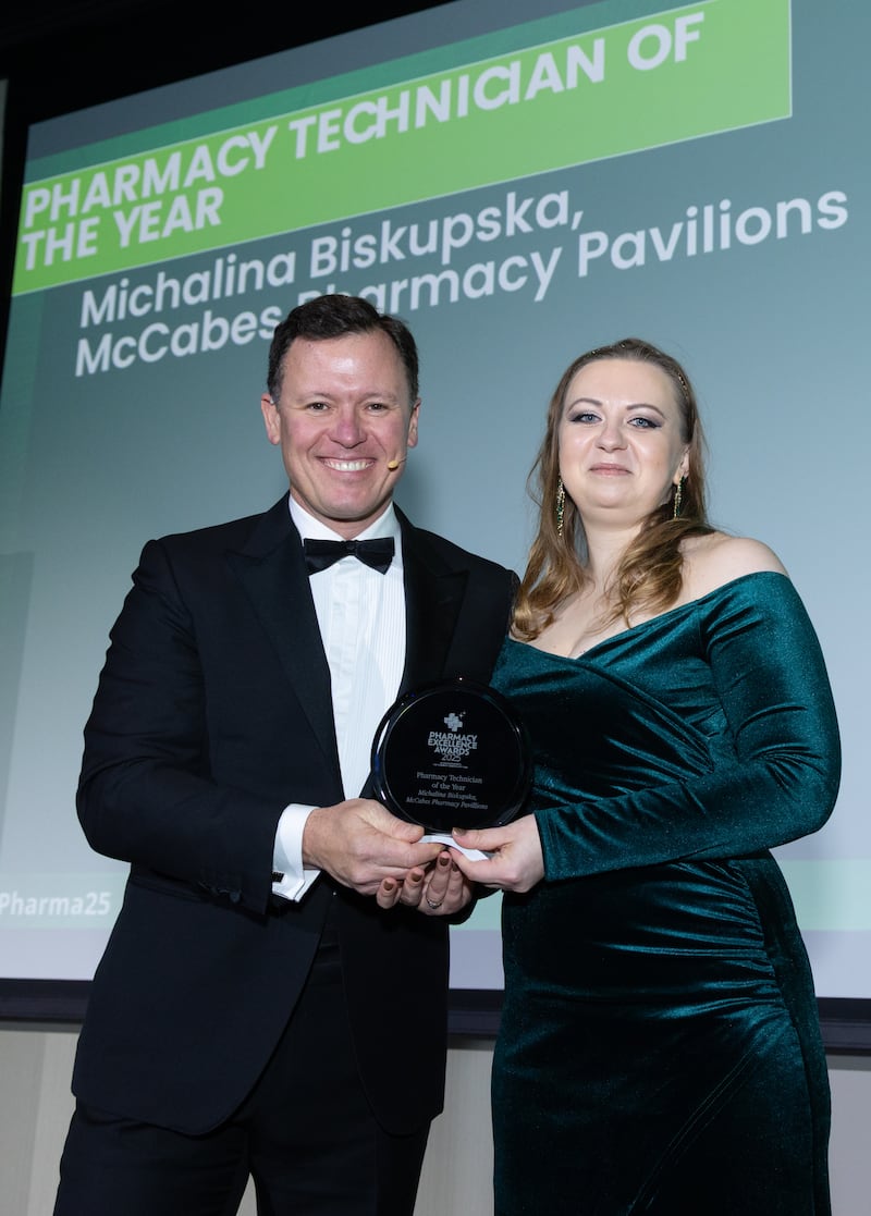 Anton Savage, MC of the awards and Michalina Biskupska, lead technician at McCabes pharmacy. Photograph: Paul Sherwood