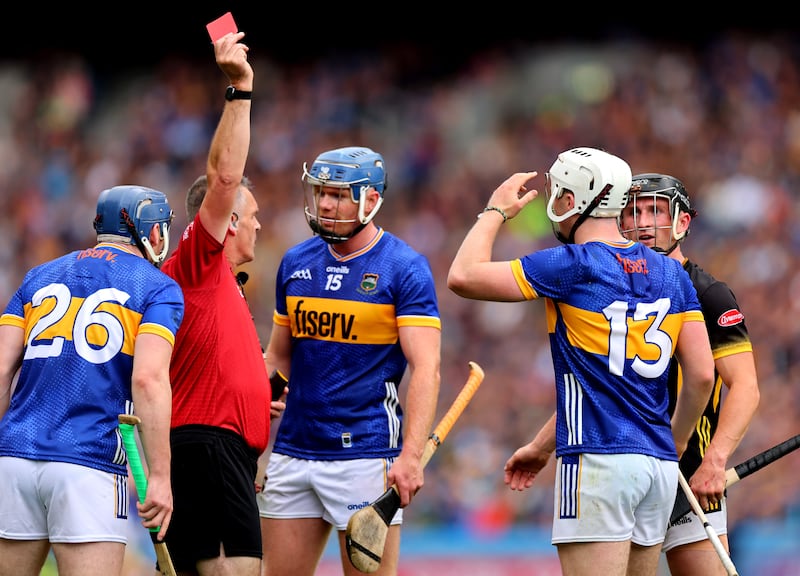 Referee James Owens red cards Darragh McCarthy of Tipperary. Photograph: James Crombie/Inpho