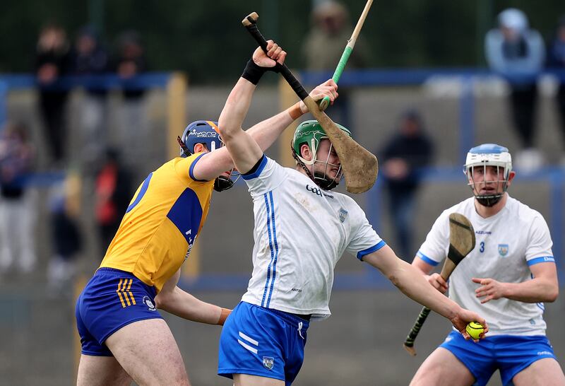 Clare's David Fitzgerald and Tom Barron of Waterford in action. Photograph: Bryan Keane/Inpho