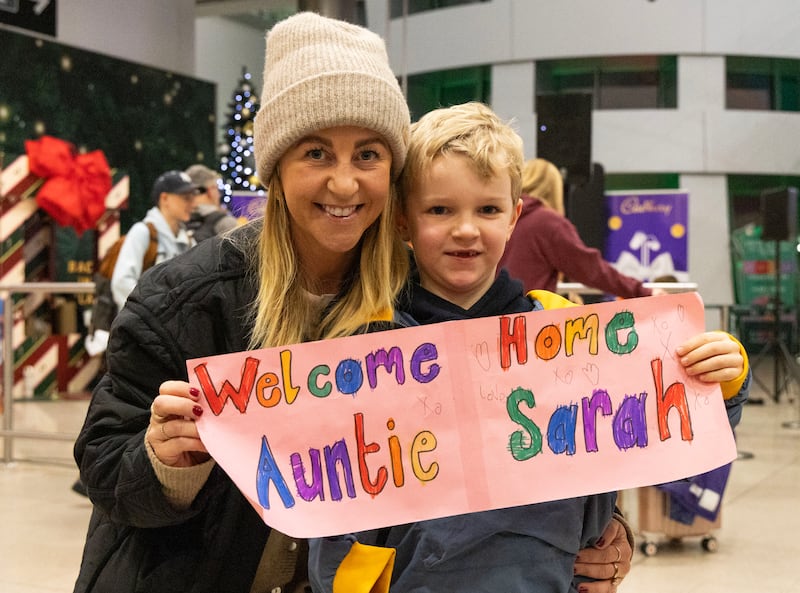 James Jess (6) from Antrim  welcomes home  his aunt, Sarah Ramage, from New Zealand. Photograph: Colin Keegan/Collins, Dublin