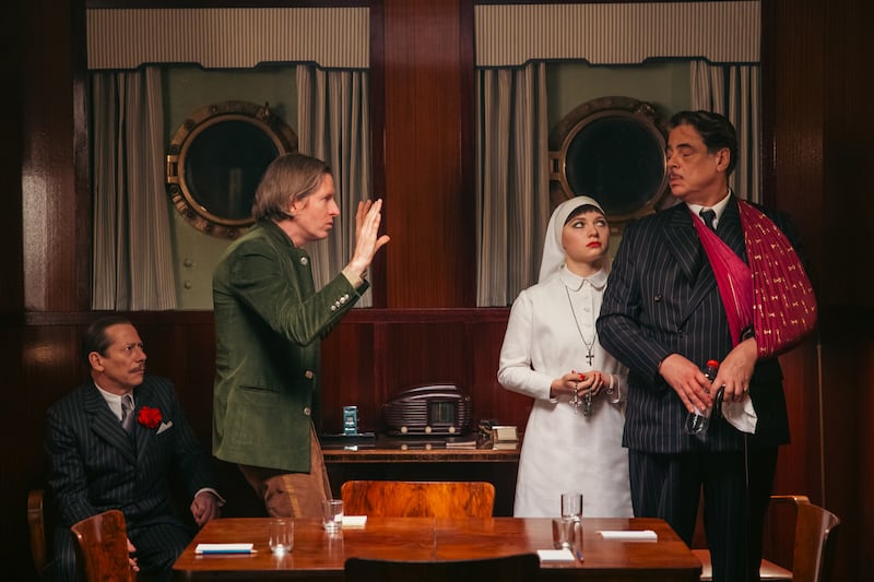 Mathieu Amalric, Wes Anderson, Mia Threapleton and Benicio Del Toro during filming of The Phoenician Scheme. Photograph: Roger Do Minh/TPS Productions/Focus Features