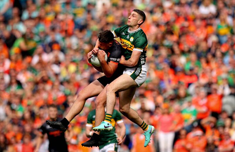 Kerry’s Paul Geaney and Armagh's Aaron McKay during the All-Ireland semi-final. Photograph: Ryan Byrne/Inpho