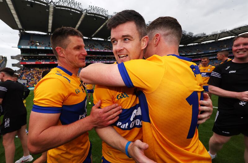 Clare's John Conlon, Tony Kelly and Paul Flanagan celebrate the dramatic All-Ireland victory over Cork at Croke Park. Photograph: James Crombie/Inpho 