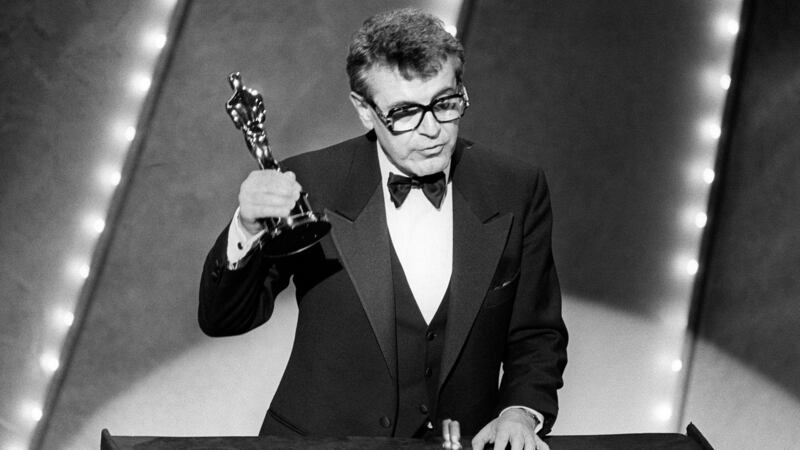 Milos Forman after winning the best director Oscar for holds up his Oscar  for his film Amadeus in 1985. Photograph: AFP/Getty Images