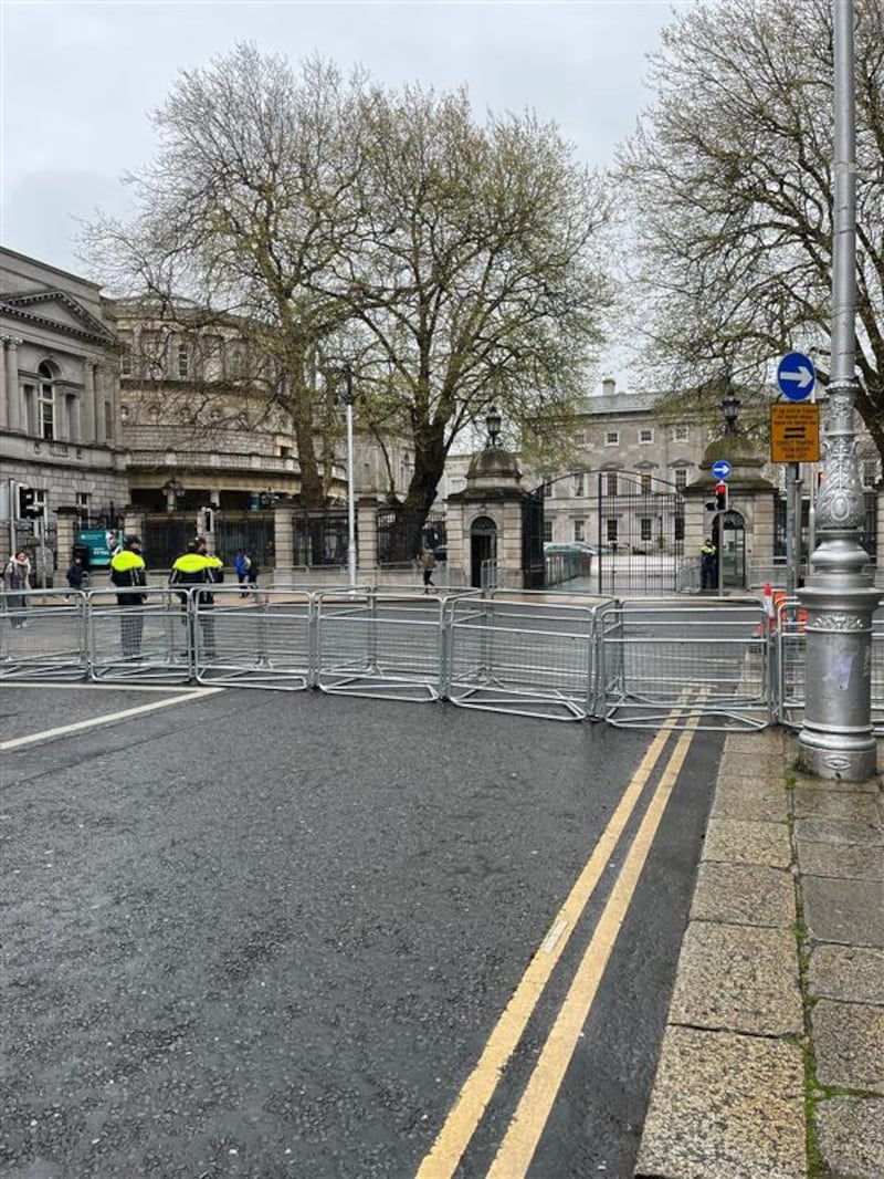 Gardaí outside Leinster House ahead of expected planned protests on Tuesday afternoon. Photograph: Cormac McQuinn