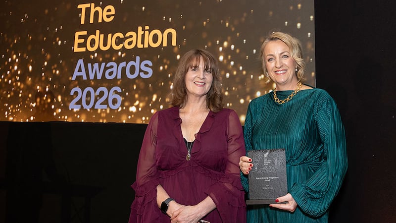Patricia O Sullivan, awards judge, presents the apprenticeship programme award award to Sheena Woods, Errigal Group