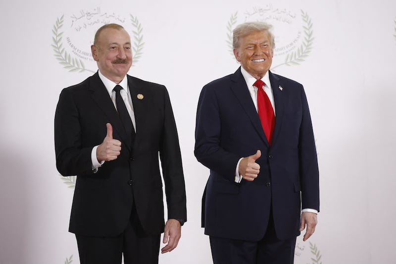 Azerbaijani President Ilham Aliyev and US President Donald Trump  pose at the Gaza Peace Summit in Sharm El-Sheikh, Photo by YOAN VALAT/POOL/AFP via Getty Images     