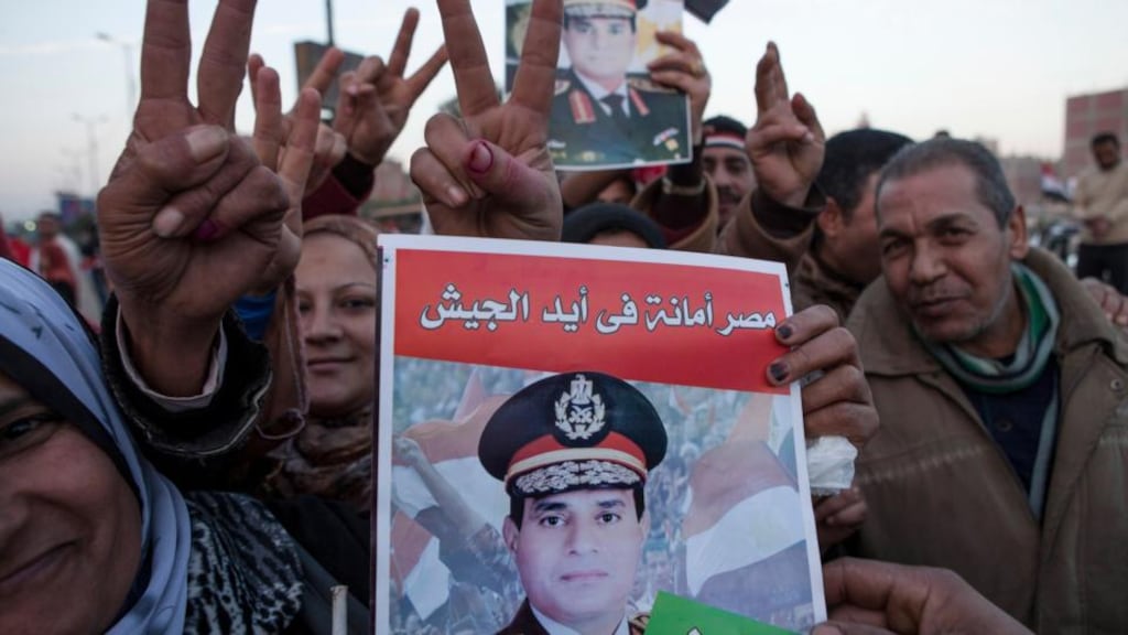 Supporters of Egyptian Defense Minister Abdel Fattah al-Sisi celebrate at the end of the second day of voting in Egypt’s constitutional referendum.