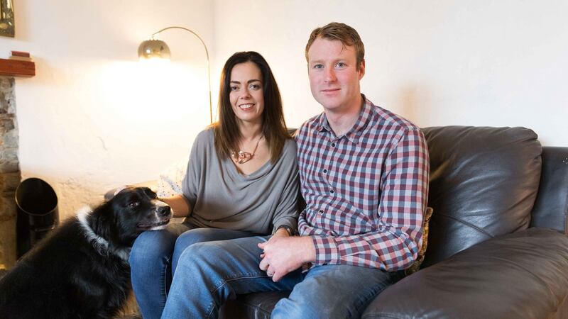 Sarah Anne Buckley and her partner Adrian Connell with dog ‘Jimmy’ at home in  West Clare. Photograph: Eamon Ward