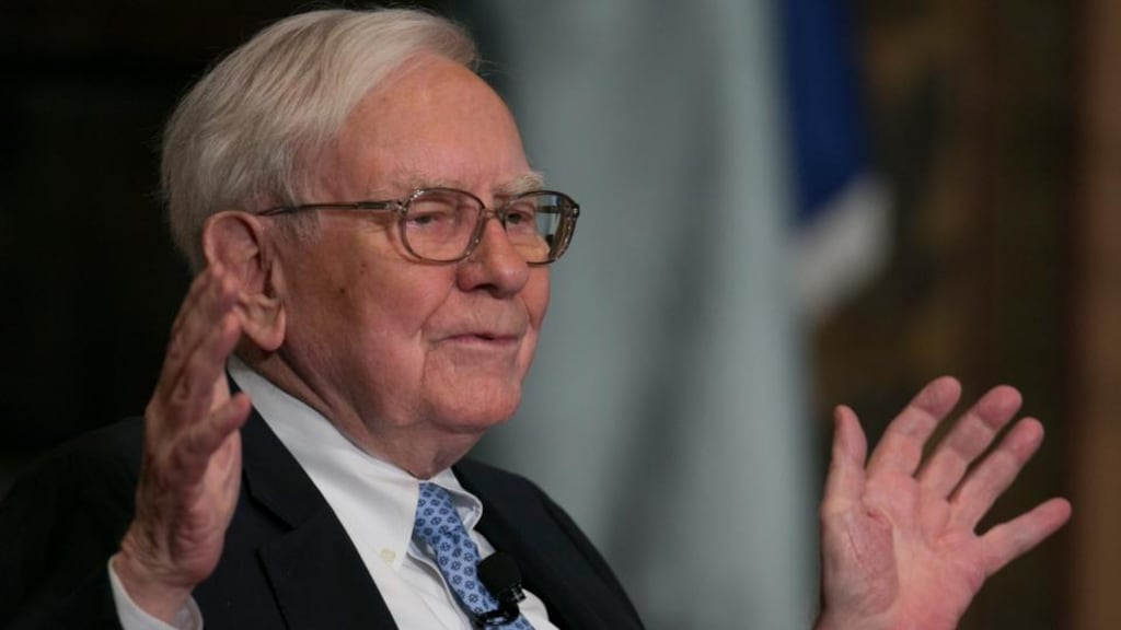 Warren Buffett has done 50 years at Berkshire Hathaway, proving it is possible to be with the same outfit forever without becoming a gormless, unimaginative loser. Photograph: Andrew Harrer/Bloomberg