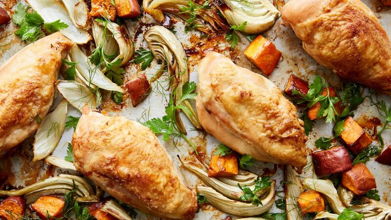 Baking tray chicken with sweet potatoes and fennel. Photograph: Linda Xiao/The New York Times.