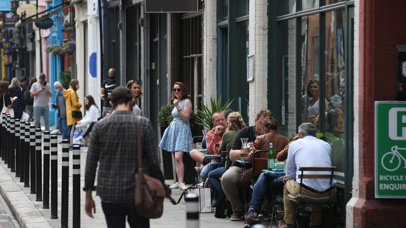 People enjoying themselves on Drury Street in Dublin. The council said the street would be pedestrianised for another two weekends. Photograph: Stephen Collins/Collins