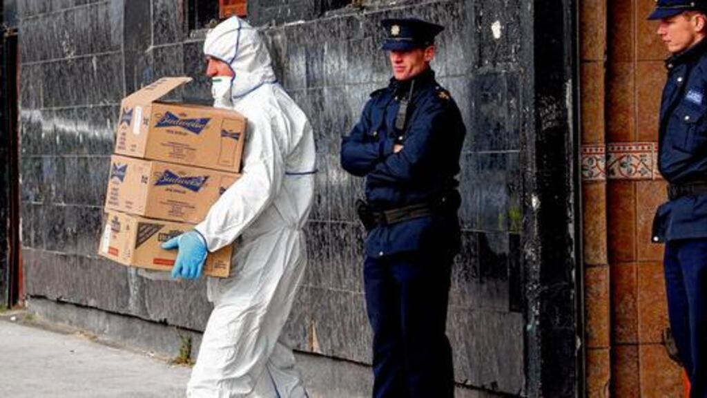 Evidence being removed yesterday from the scene of the fatal shooting of a man at the Cabra House pub, Dublin. photograph: colin keegan/collins