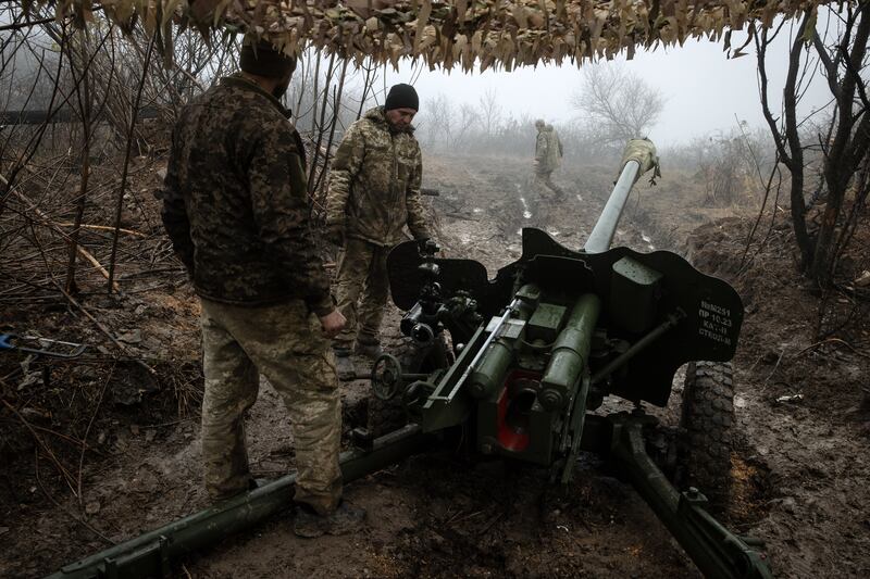 The 22nd Mechanised Brigade prepares to fire on Russian positions near Bakhmut in Ukraine. Photograph: Tyler Hicks/New York Times
                      