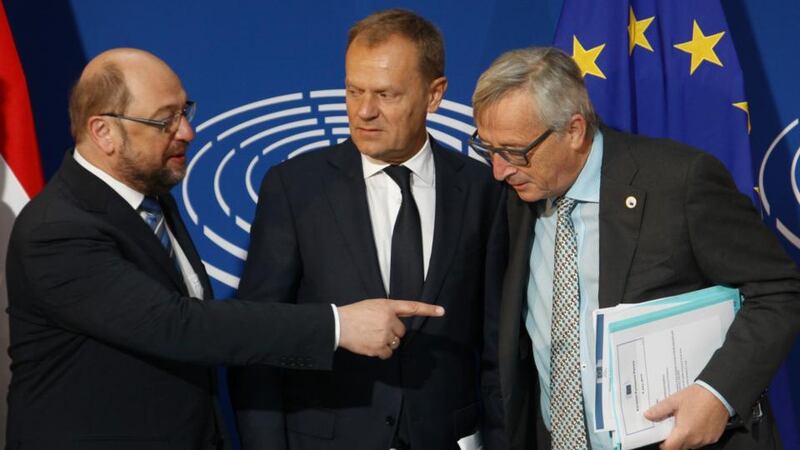 President of the parliament Martin Schultz (left), president of EU council Donald Tusk (centre) and president of the EU commission Jean-Claude Juncker at the European Parliament on Wednesday. Mr Tusk has become the latest figure to call for a proposal on debt sustainability for Greece. Photograph: AFP