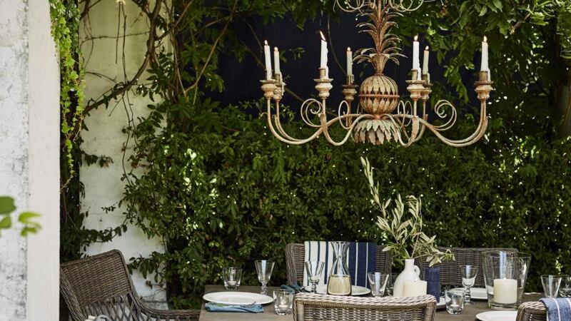 Add drama to your outdoor  space with an elaborate rococo candelabra.