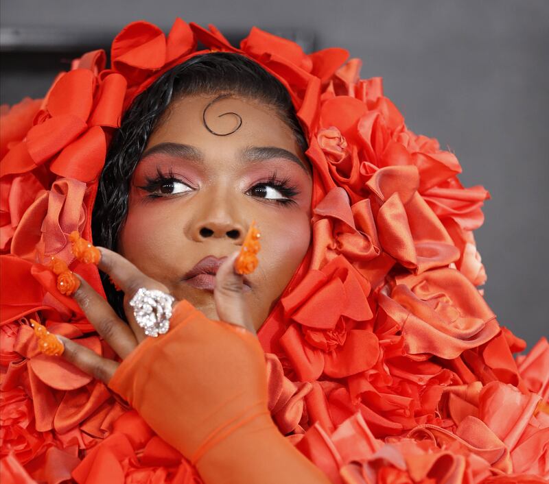 Lizzo arrives: A bouquet of joy. Photograph: Caroline Brehman/EPA