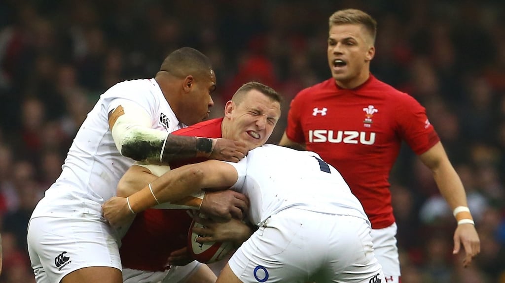 England’s Kyle Sinckler tackles Wales centre Hadleigh Parkes during the Six Nations match at the Principality Stadium. Photograph: Geoff Caddick/AFP