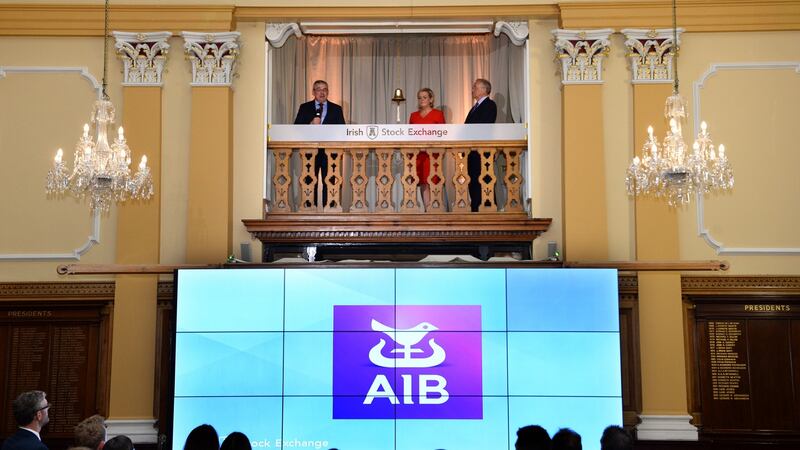 AIB CEO Bernard Byrne rings the bell at the Irish Stock Exchange with Irish Stock Exchange CEO Deirdre Somers and AIB chairman Richard Pym in June 2017. Photograph: Dara Mac Dónaill