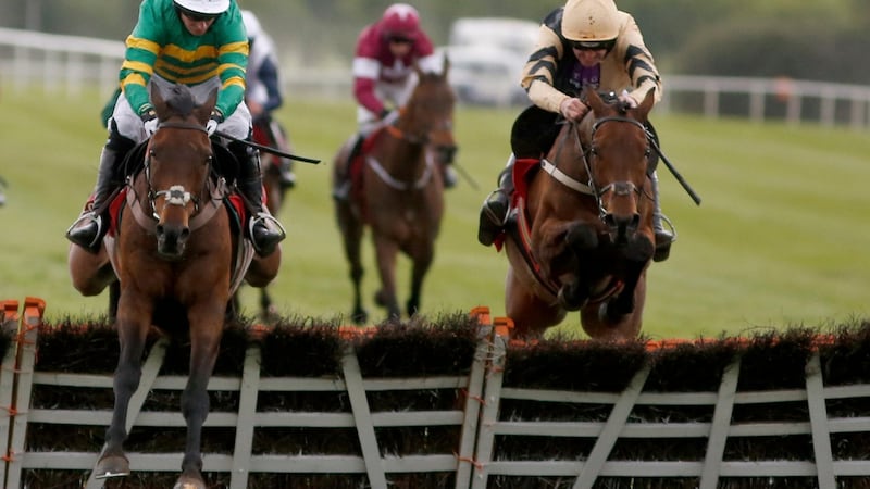 Noel Fehily riding Unowhatimeanharry  clears the last to win the Ladbrokes Champion Stayers Hurdle from Nichols Canyon  at Punchestown racecourse on April 27th  in Naas. Photograph:  Alan Crowhurst/Getty