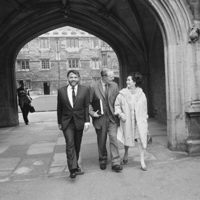 Nevill Coghill (centre) with his former student Richard Burton and Elizabeth Taylor at Oxford University in 1966. Photograph: Larry Ellis/Daily Express/Hulton Archive/Getty