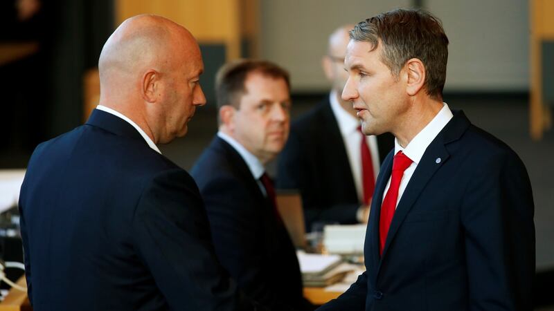 Björn Höcke (right), head of the far-right wing of the AfD,  congratulates Free Democratic Party candidate Thomas Kemmerich after he was elected new Thuringia premier on Wednesday. Photograph: Hannibal Hanschke/Reuters