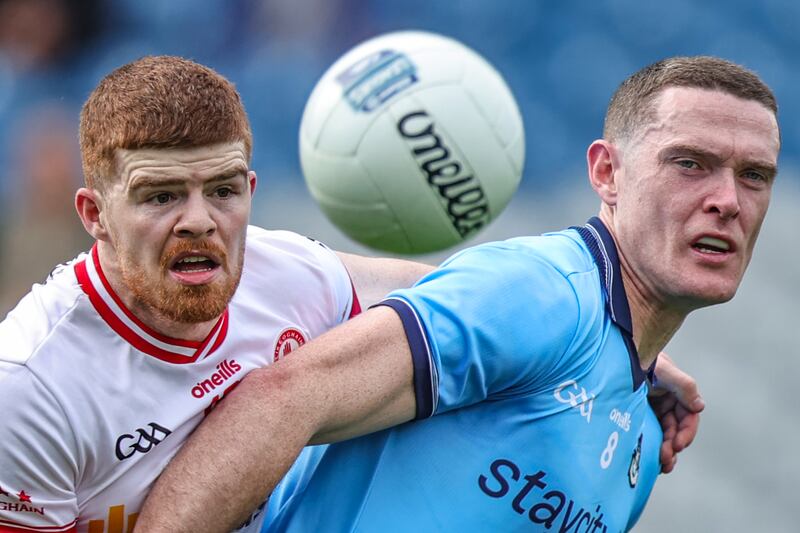 Tyrone's Cathal McShane challenges Dublin's Brian Fenton during the 
Allianz Football League Division One game at Croke Park. Photograph: Tom Maher/Inpho