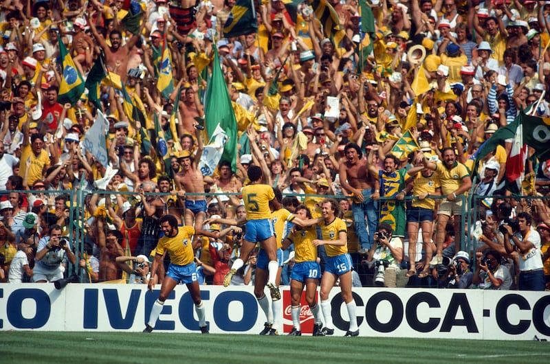 Brazil supporters celebrate a goal by Socrates in a game against Italy at the 1982 World Cup. Photograph: Mark Leech/Offside/Getty
