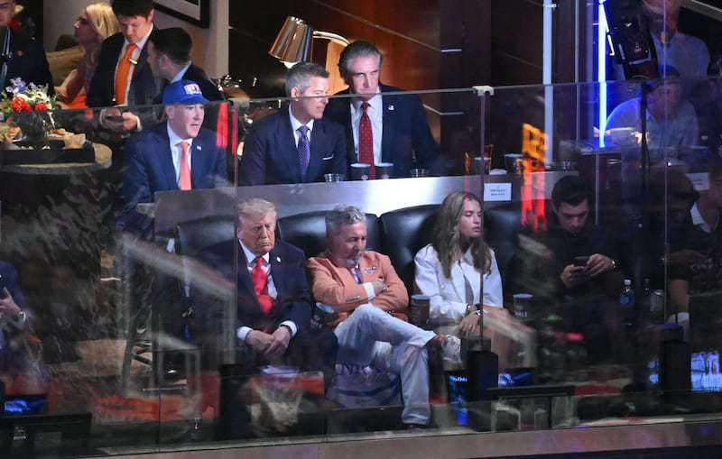 US president Donald Trump sits next to Knicks owner James Dolan as they attend game three of the NBA finals between the San Antonio Spurs and the New York Knicks earlier this week. Photograph: Saul Loeb/AFP via Getty Images