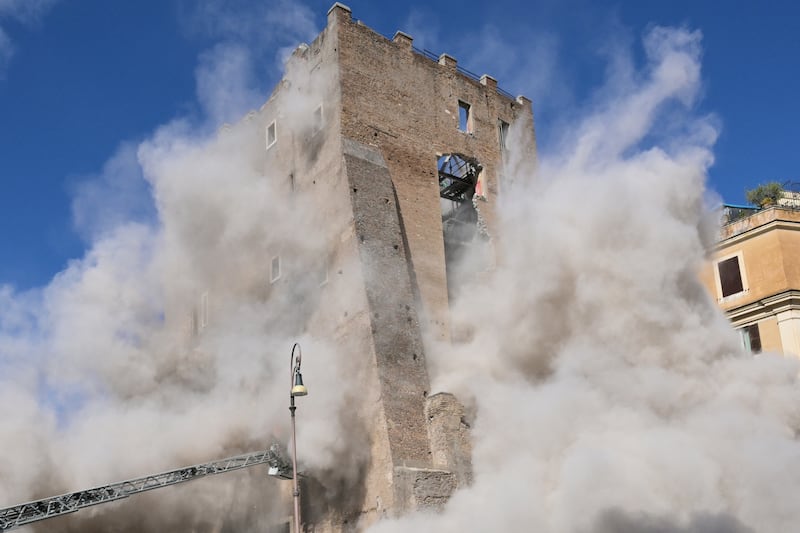 Dust rises following the second collapse of part of the tower on Monday. Photograph: Tiziana Fabi/AFP via Getty
