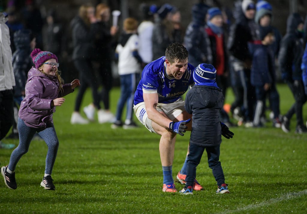 Darren Hughes of Scotstown celebrates with his son Cillian and daughter Ava. Photograph: Andrew Paton/Inpho