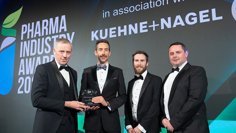 Dermot Browne, sales and commercial manager at BOC Gases Ireland, presents the engineering project of the year to the Amgen team