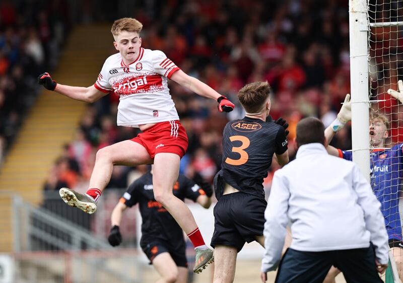 Derry's Cody Rocks punches in to score his side’s second goal of the game. Photograph: Tom Maher/Inpho