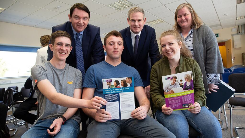 Acadamh na Gaeilge, OÉG students, from left: Erin Mac an tSaoir, Dublin; Eoin de Bhailís, An Cheathrú Rua, Co Galway and Ciara Ní Mhéalóid, Camus Uachtar, Co Galway at the announcement by Minister of State for the Irish Language Seán Kyne TD of a €250,000 student Gaeltacht fund. With the Minister are Séamas Ó Concheanainn, Acadamh na Gaeilge, OÉG Carna and Dr Dorothy Ní Uigín, Áras na Gaeilge, OÉG Galway. Photograph: Seán Ó Mainnín