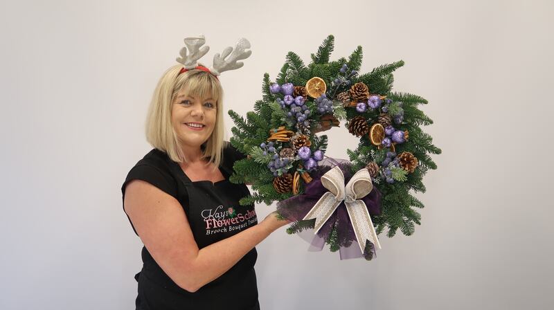 Deirdre Sullivan of Kay’s Flower School in Dublin with one of her wreaths