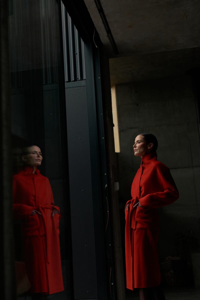 Cherry red cashmere and wool coat with patch pockets and dropped sleeves €550, Helen McAlinden