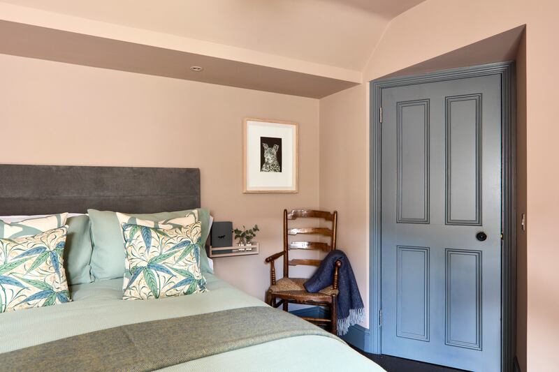 Darran says he's thrilled with how the colours compliment each other in the bedroom