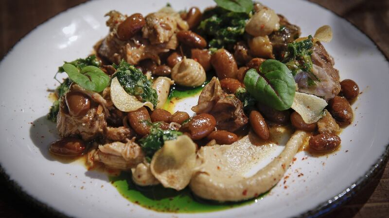 Osso bucco with borllotti beans, roast cauliflower purée and parsley oil.