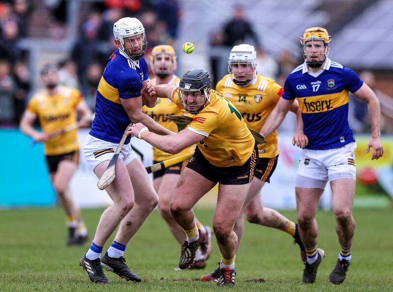 Antrim's Domhnall Nugent with Tipperary's Michael Breen in close attendance during the league game in Division 1 Group B at Corrigan Park, Belfast, last March. File photograph: John McVitty/Inpho
